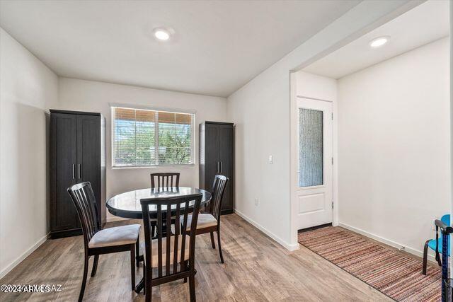 dining room with light hardwood / wood-style flooring