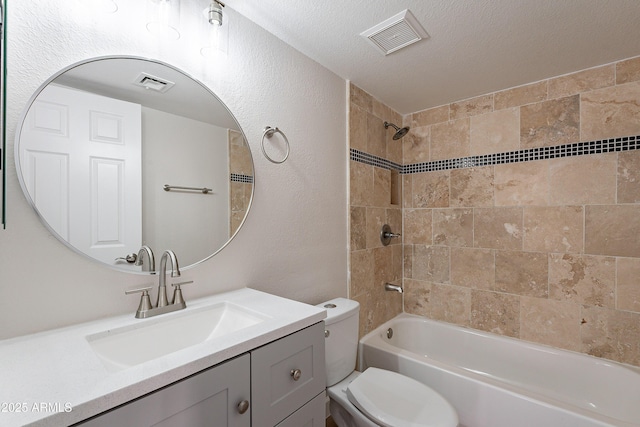 16609 S 41st St, Phoenix, AZ 85048 - full bath with vanity, shower / bathtub combination, a textured ceiling, and a textured wall