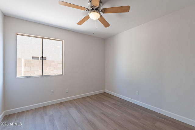 16609 S 41st St, Phoenix, AZ 85048 - empty room featuring wood finished floors and a ceiling fan