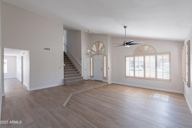 16609 S 41st St, Phoenix, AZ 85048 - entryway featuring light wood-style floors, stairway, a ceiling fan, and vaulted ceiling