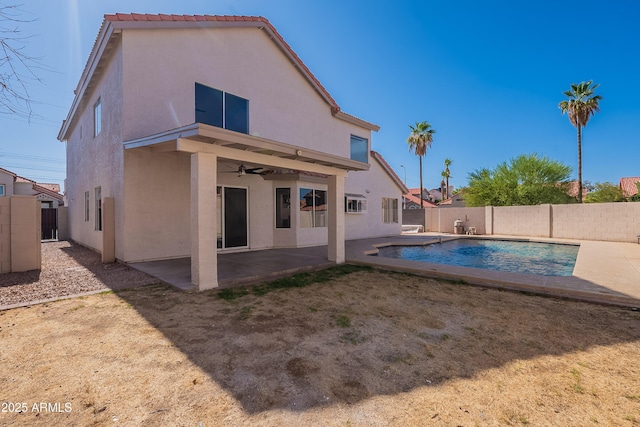 16609 S 41st St, Phoenix, AZ 85048 - back of house with a ceiling fan, stucco siding, a fenced backyard, and a patio area