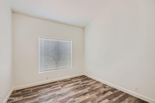 spare room featuring hardwood / wood-style flooring