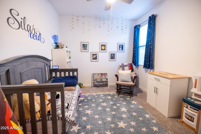 bedroom featuring carpet flooring and baseboards