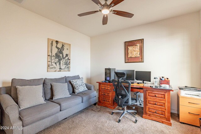 carpeted office with ceiling fan