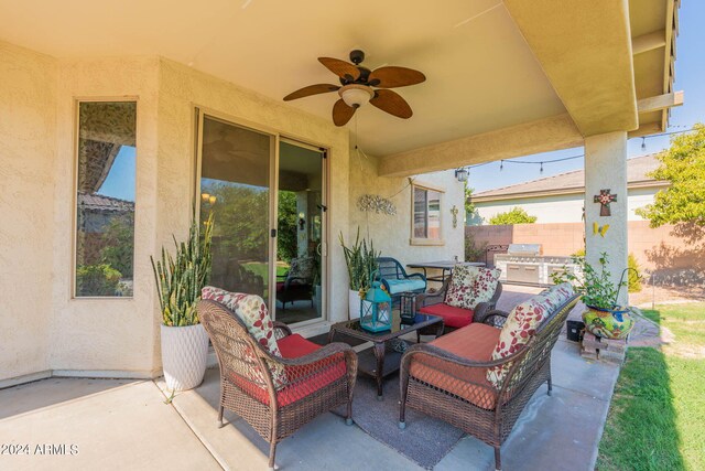 view of patio / terrace featuring an outdoor kitchen, grilling area, and ceiling fan