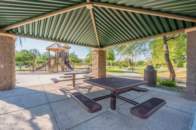 view of patio with a playground