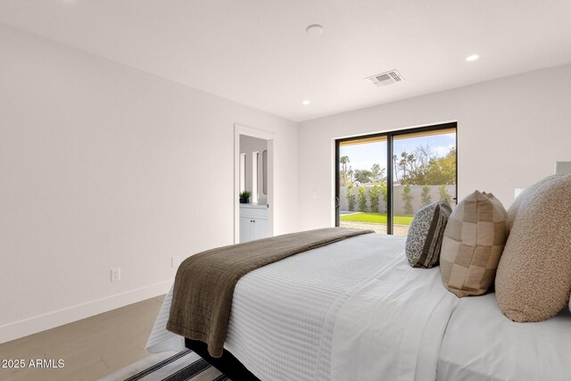 bedroom with baseboards, recessed lighting, visible vents, and access to exterior