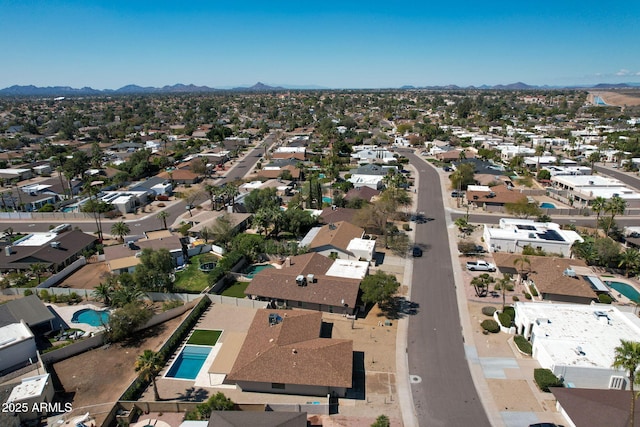 birds eye view of property featuring a residential view and a mountain view