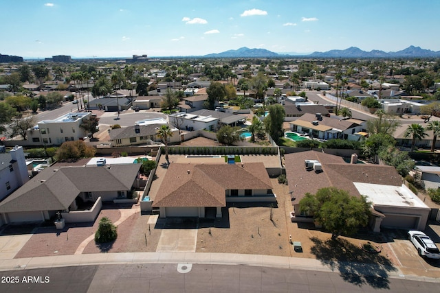 birds eye view of property featuring a residential view and a mountain view