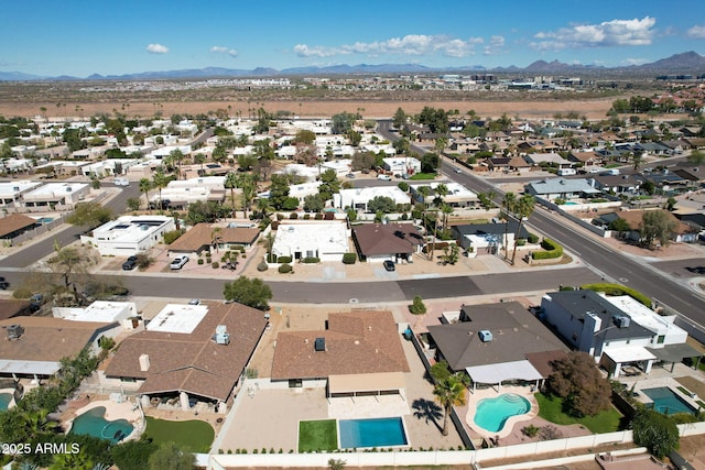 aerial view with a residential view and a mountain view