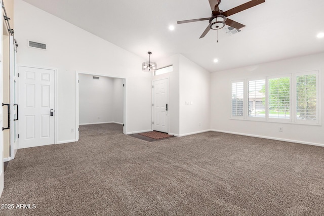 unfurnished living room with dark carpet, baseboards, a ceiling fan, recessed lighting, and high vaulted ceiling