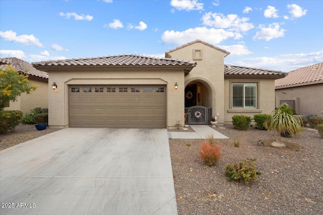 mediterranean / spanish-style home featuring a garage