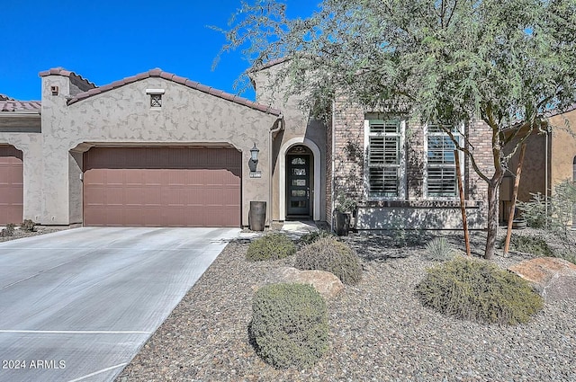 view of front of home featuring a garage