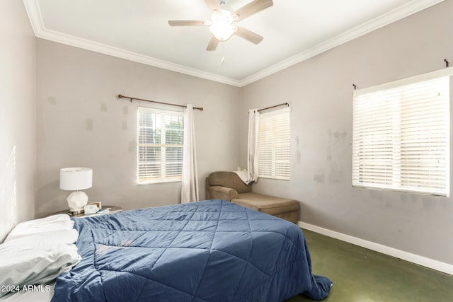 carpeted bedroom featuring ceiling fan and ornamental molding