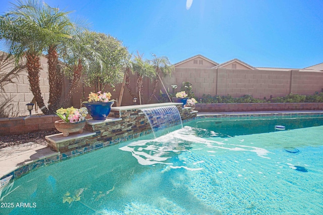 view of pool with a fenced in pool and a fenced backyard