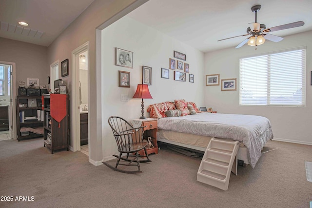 carpeted bedroom featuring recessed lighting, visible vents, and baseboards