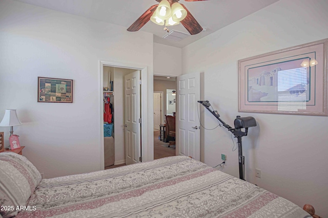 bedroom featuring ceiling fan and visible vents