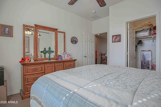 bedroom featuring a ceiling fan, carpet flooring, and visible vents