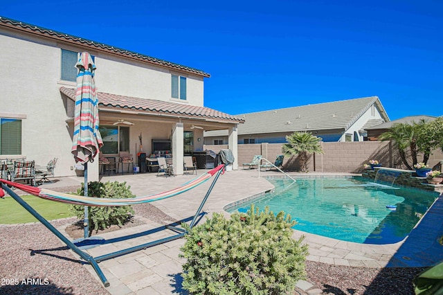 view of swimming pool with a fenced in pool, a patio area, and a fenced backyard