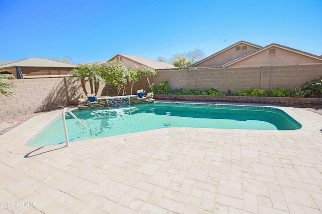 view of swimming pool with a fenced backyard, a fenced in pool, and a patio