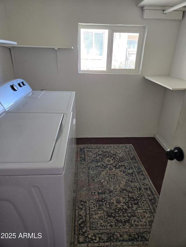 laundry area with washing machine and clothes dryer