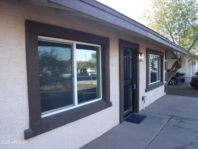 view of side of home with a patio