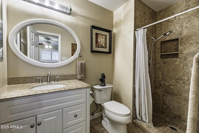 308 E Ln Jolla Dr, Tempe, AZ 85282 - full bath featuring ceiling fan, toilet, vanity, and a tile shower