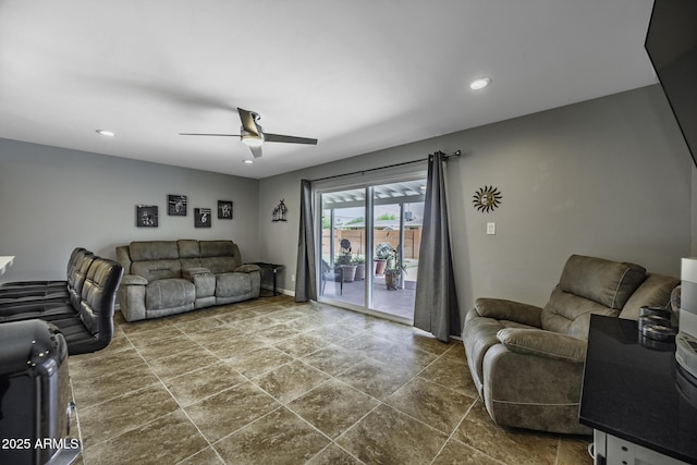 308 E Ln Jolla Dr, Tempe, AZ 85282 - living room with ceiling fan, dark stone finish flooring, recessed lighting, and baseboards