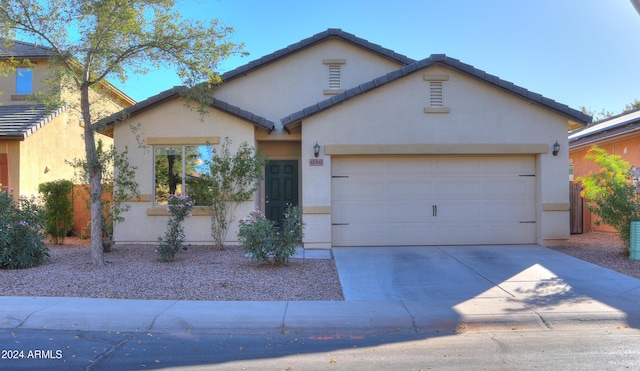 view of front of home featuring a garage