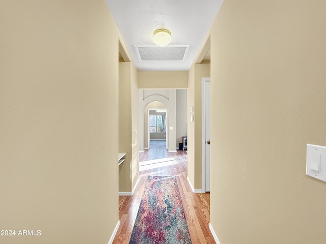 hallway featuring light hardwood / wood-style flooring