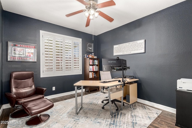16565 W Garfield St, Goodyear, AZ 85338 - office space featuring wood finished floors, a ceiling fan, baseboards, and a textured wall