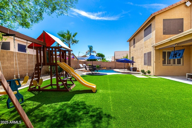 16565 W Garfield St, Goodyear, AZ 85338 - view of yard with a playground and a patio