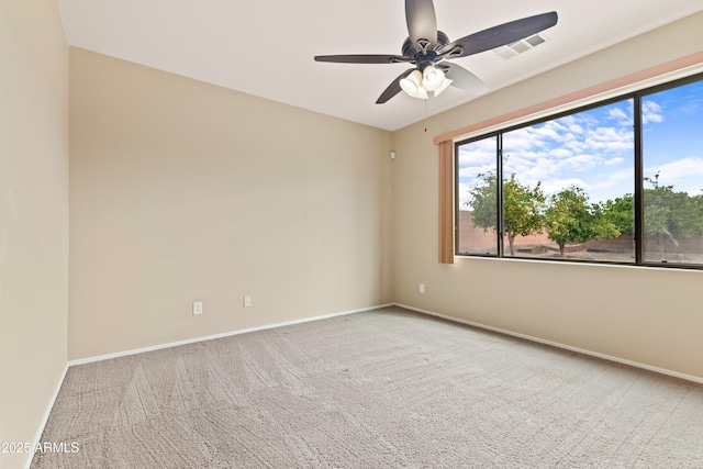 unfurnished room with a ceiling fan, carpet, baseboards, and visible vents