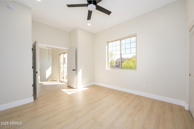 spare room with ceiling fan and light hardwood / wood-style flooring