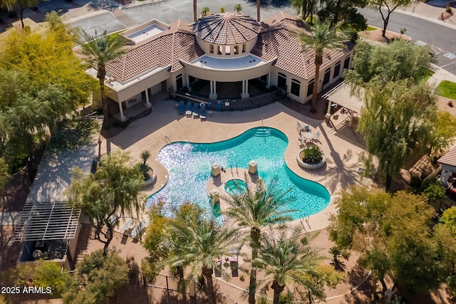 view of swimming pool featuring a patio area