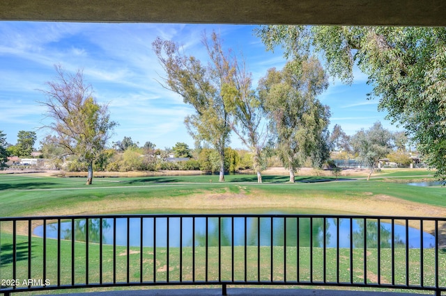 view of community with a water view and a lawn