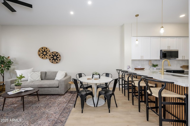 dining area featuring ceiling fan