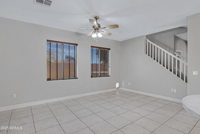 unfurnished room featuring ceiling fan