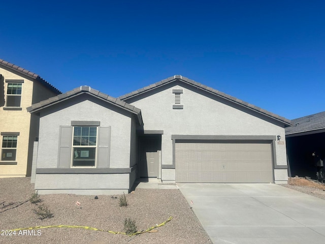 ranch-style house with a garage