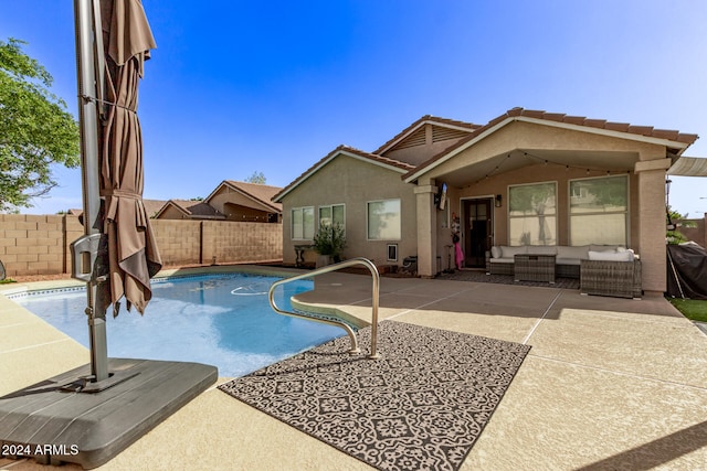 view of pool with an outdoor hangout area and a patio