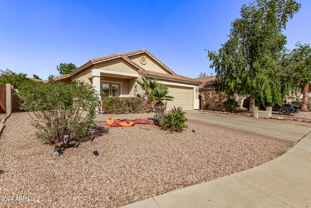 view of front of property with a garage