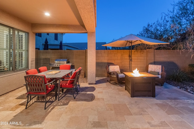 patio terrace at dusk with grilling area