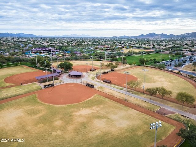 birds eye view of property with a mountain view