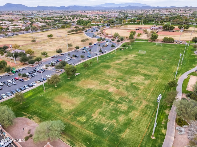 birds eye view of property featuring a mountain view