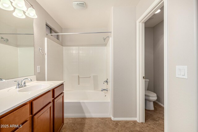 full bath with vanity, baseboards, tile patterned floors, shower / bath combination, and toilet