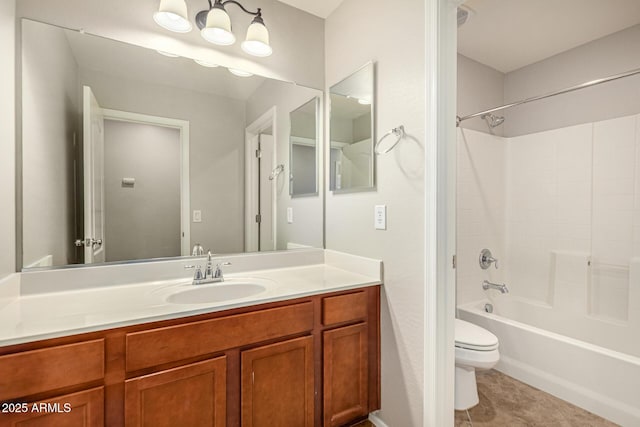 bathroom with tile patterned floors,  shower combination, vanity, and toilet