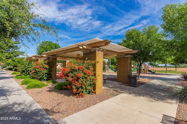 surrounding community featuring a pergola and playground community