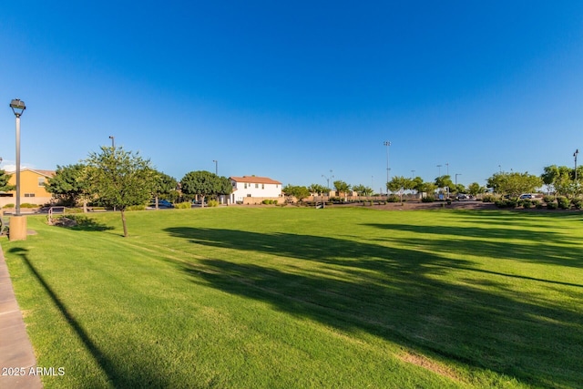 surrounding community with a lawn