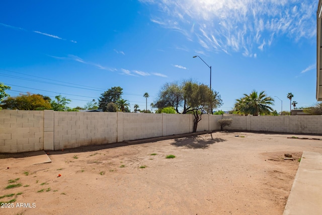 view of yard featuring a fenced backyard