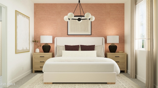 bedroom featuring baseboards and light carpet